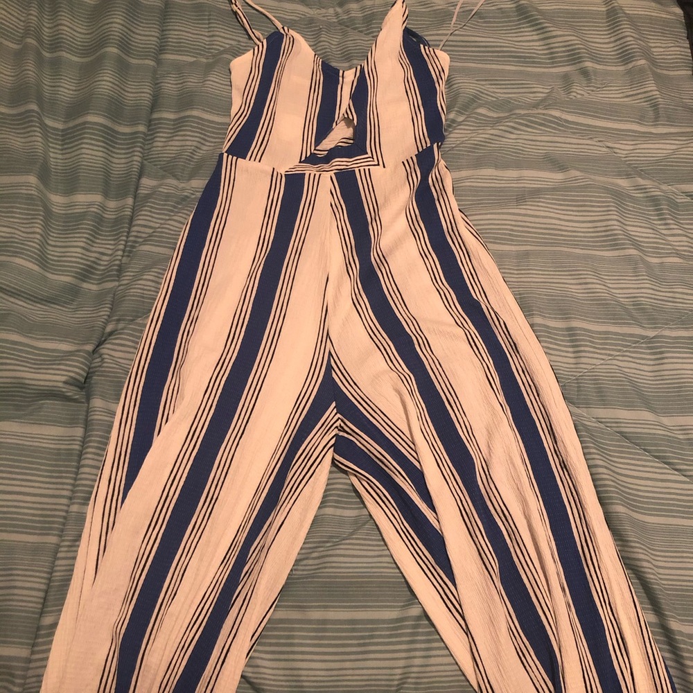 Jumpsuit — new with cutout details size small
